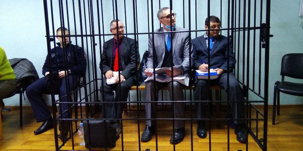 Vladimir Piskarev, Vladimir Melnik and Artur Putintsev in a cage during a court hearing. November 2022