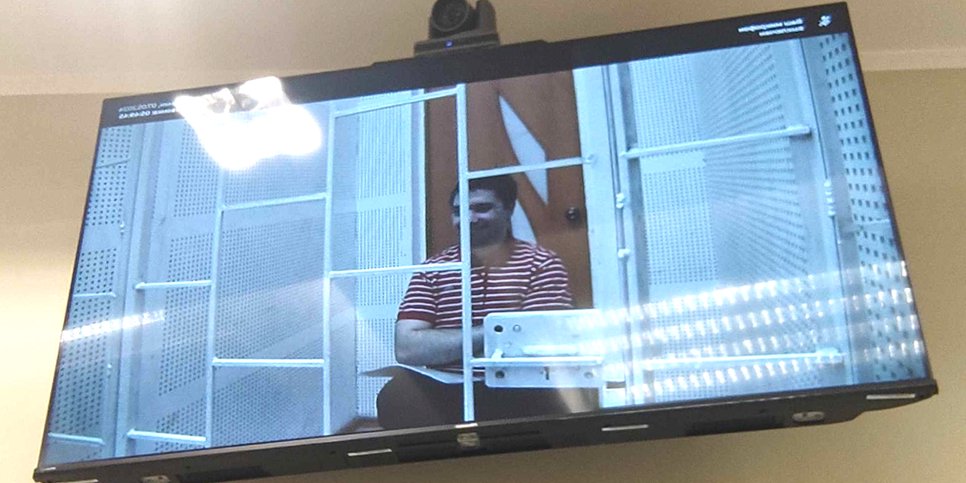 Danil Suvorov participates in the appeal hearing via video-conferencing from the pre-trial detention center